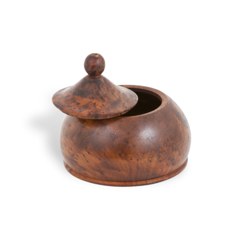 A uniquely drop-shaped Thuya Woodbox exhibiting Moroccan Folk Art Deco, beautifully crafted from thuya root's wood by TUYYA.