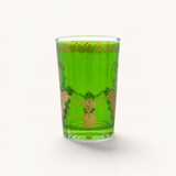 TUYYA Fibule tea cup in vibrant green glass with intricate gold filigree patterns for traditional Moroccan tea service.