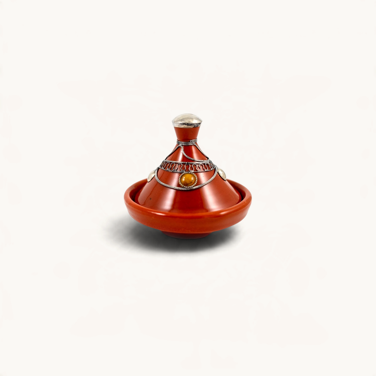 TUYYA handcrafted terracotta mini tajine with decorative silver metal ornaments and a warm reddish-brown finish.