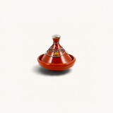 TUYYA handcrafted terracotta mini tajine with decorative silver metal ornaments and a warm reddish-brown finish.