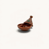 TUYYA handcrafted brown ceramic mini tajine with silver metal ornaments and a green stone accent on the lid.