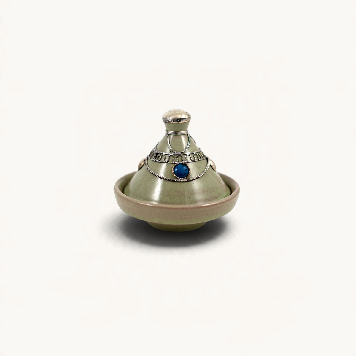 TUYYA handcrafted green ceramic mini tajine with silver metal ornaments and a blue stone accent on the lid.
