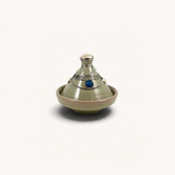 TUYYA handcrafted green ceramic mini tajine with silver metal ornaments and a blue stone accent on the lid.