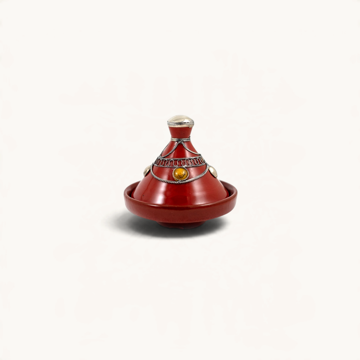 TUYYA handcrafted red ceramic mini tajine with silver metal ornaments and a decorative yellow stone accent.