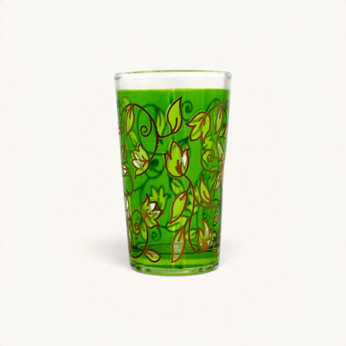 TUYYA 4 oz green Moroccan tea glass featuring intricate hand-painted floral vine patterns and gold accents.