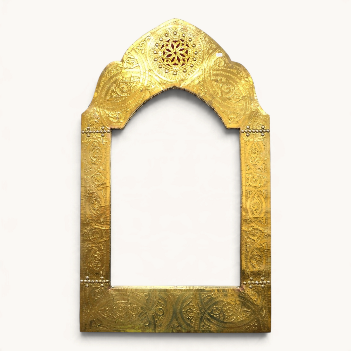 TUYYA Moorish style wall mirror with an intricate handcarved gilded copper frame featuring traditional patterns.