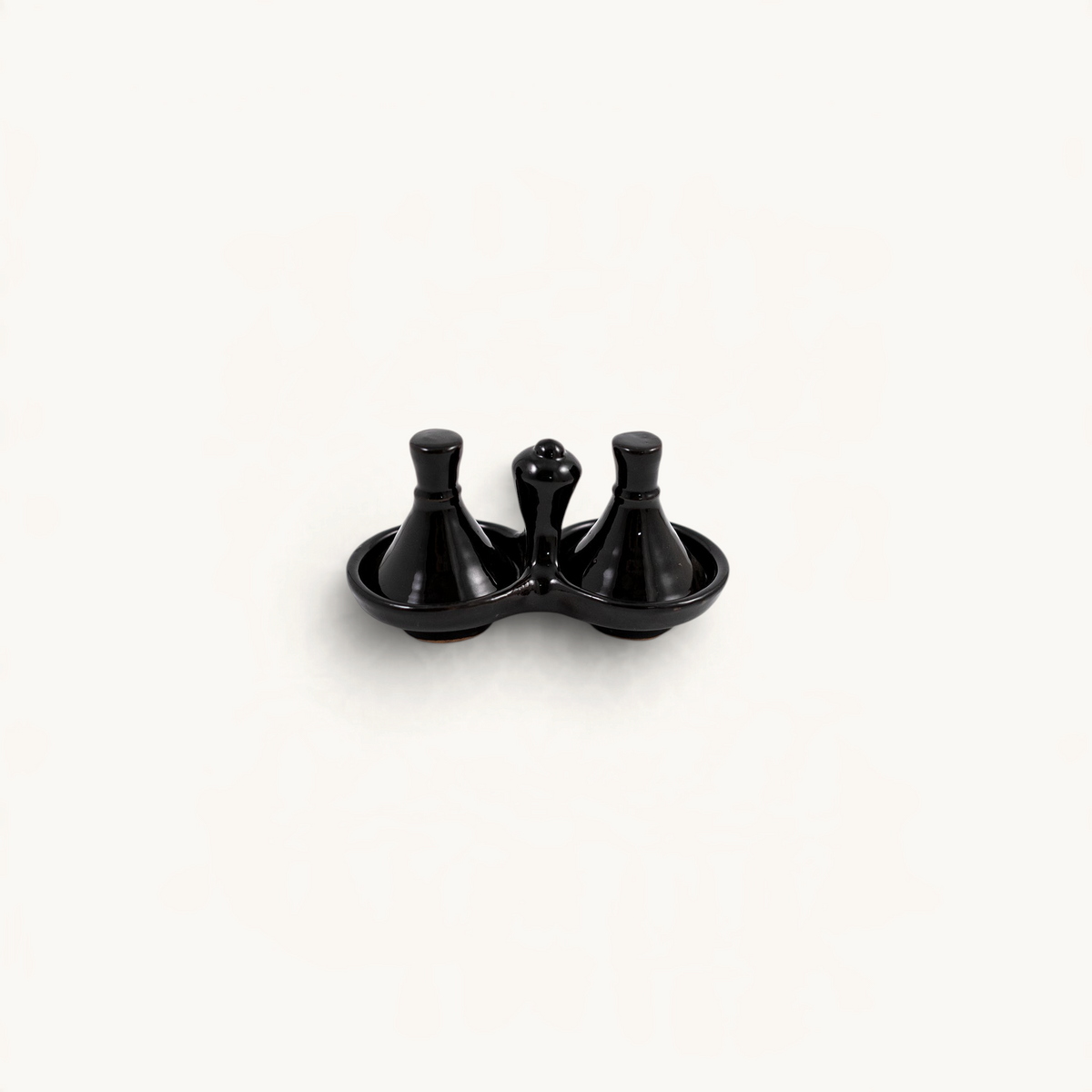 TUYYA handmade black ceramic mini tajine salt and pepper set with a glossy finish for elegant table serving.