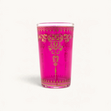 TUYYA Marjana 4 oz tea cup in vibrant pink glass with intricate gold filigree patterns for traditional Moroccan tea.
