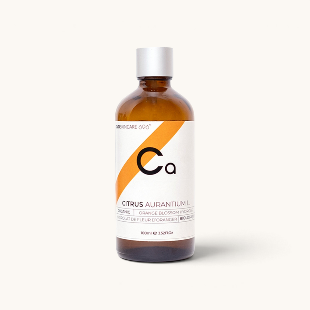 100ml bottle of OVO Skincare's Moroccan Orange Blossom Distillate with a dropper.