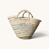 TUYYA Lilou small handwoven Moroccan wicker basket with a simple handle for storage or gift presentation.