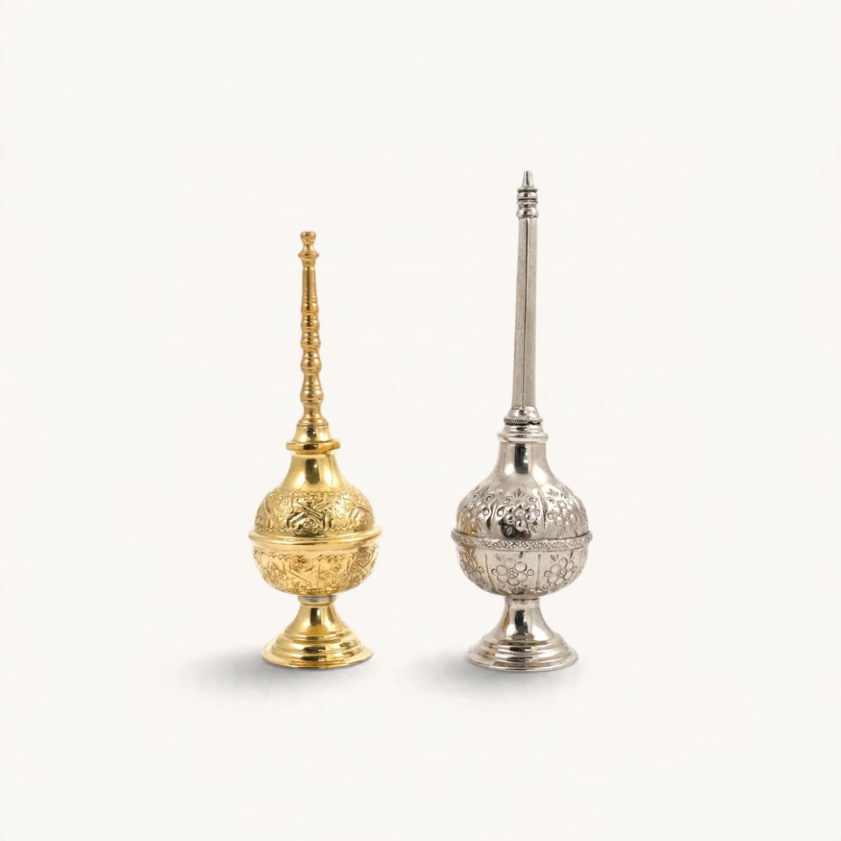 TUYYA gold and silver plated Moroccan rose water sprinkler bottles with intricate hand-embossed floral patterns.
