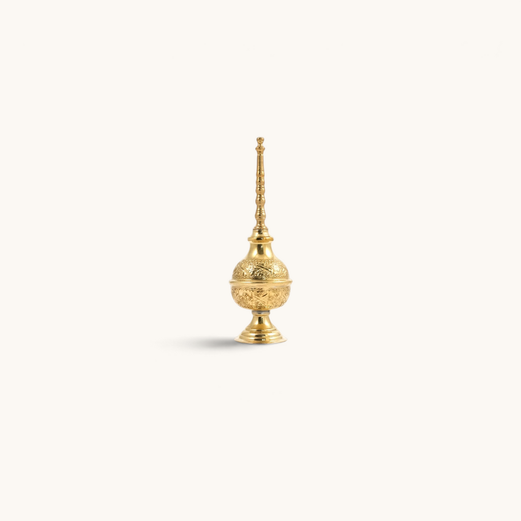 tuyya handcrafted yellow copper Moroccan rose water sprinkler bottle with intricate hand-embossed floral patterns