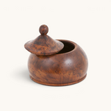 A uniquely drop-shaped Thuya Woodbox exhibiting Moroccan Folk Art Deco, beautifully crafted from thuya root's wood by TUYYA.