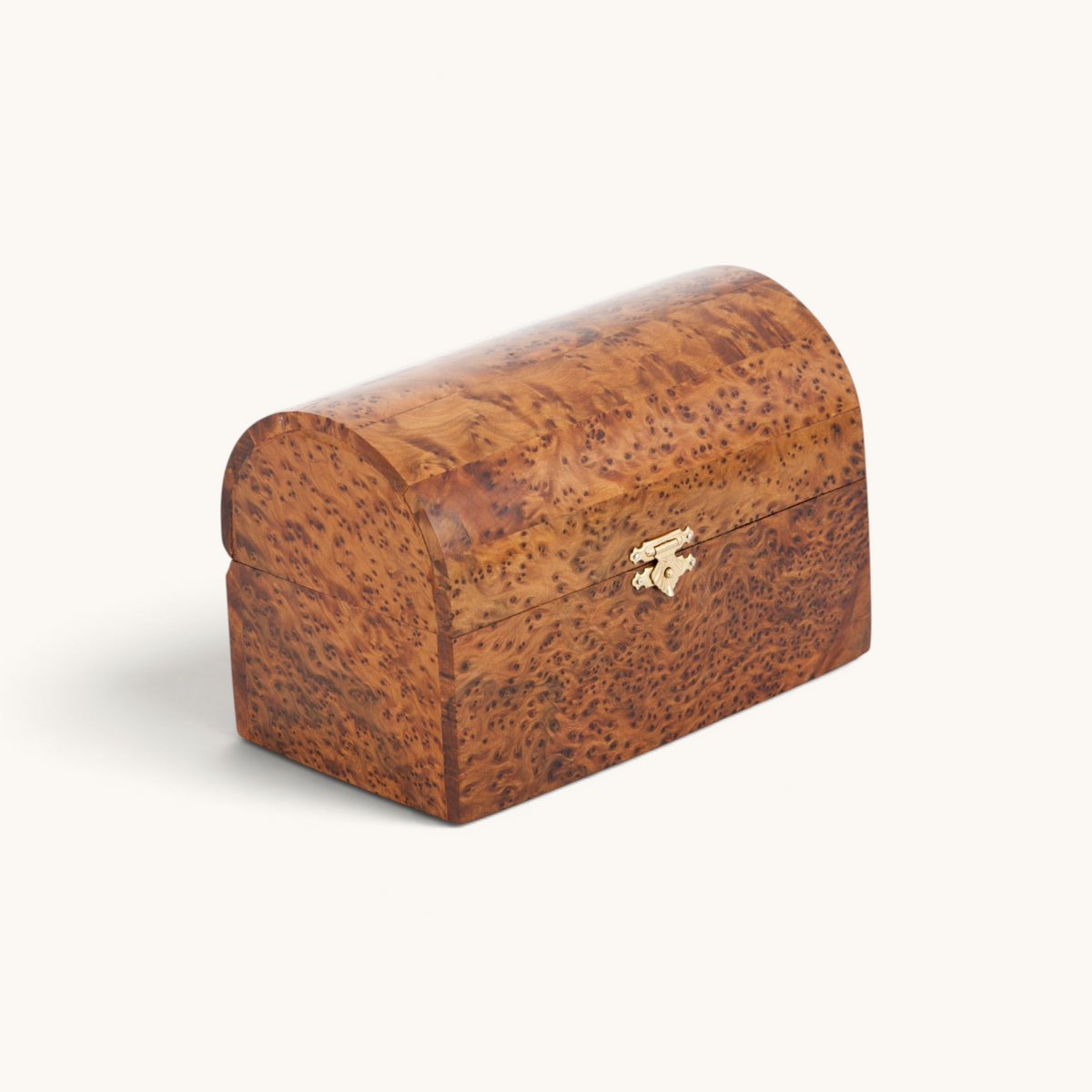 A handcrafted Thuya Wood Puzzle Box with intricate designs and a copper lock, embodying the unique Moroccan artisanship by TUYYA.