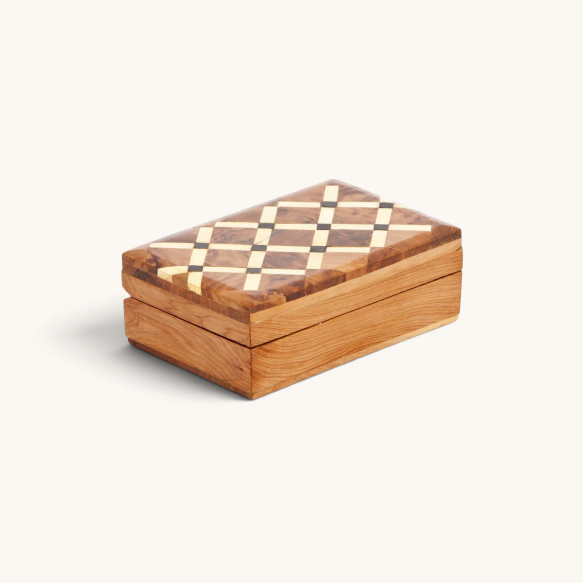 Premium Thuya Woodbox, rectangular, featuring a full top pattern of intersecting Lemon and Ebony woods with a mahogany centerpiece, capturing the spirit of Moroccan craftsmanship.