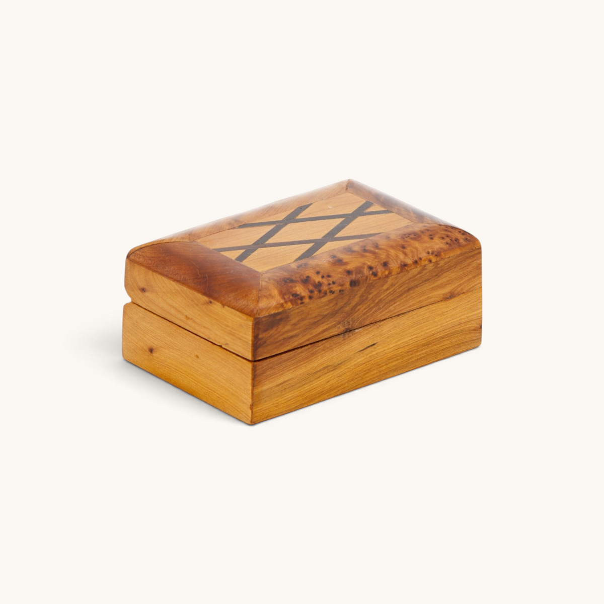 Thuya Woodbox, rectangular shaped with mahogany inlays and a beautiful thuya root perimeter, showcasing Morocco's finest craftsmanship, offered by TUYYA.