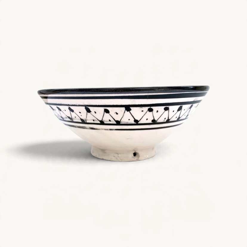 TUYYA handmade Moroccan ceramic bowl in black and white with traditional geometric patterns and a wide rim.