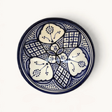 TUYYA handmade Moroccan ceramic bowl in blue and white with intricate traditional geometric and floral patterns.