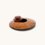 TUYYA's Moroccan Thuya Woodbox, an oval-shaped treasure displaying the exquisite craftsmanship of Moroccan artisans, handcrafted from richly grained Thuya root wood.
