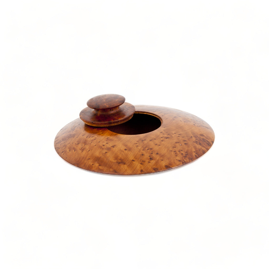 TUYYA's Moroccan Thuya Woodbox, an oval-shaped treasure displaying the exquisite craftsmanship of Moroccan artisans, handcrafted from richly grained Thuya root wood.