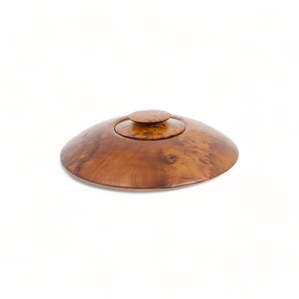 TUYYA's Moroccan Thuya Woodbox, an oval-shaped treasure displaying the exquisite craftsmanship of Moroccan artisans, handcrafted from richly grained Thuya root wood.