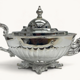 TUYYA Manchester Britishtime silver-plated teapot with ornate legs and a classic, elegant silhouette.