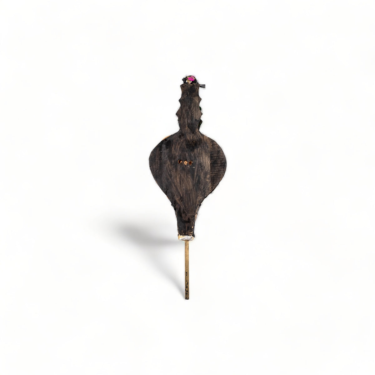 Encarved Moroccan Rabouz, showcasing Berber patterns and calligraphy of "Maroc," camel, and Marrakech Kasbah, used for igniting fires or as a decorative piece.