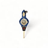 Blue Small Moroccan Rabouz with Berber patterns and concentric stars design, adorned with copper rivets for a traditional look.