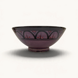 TUYYA handmade Moroccan ceramic bowl in vivid purple with traditional black and red painted geometric patterns.