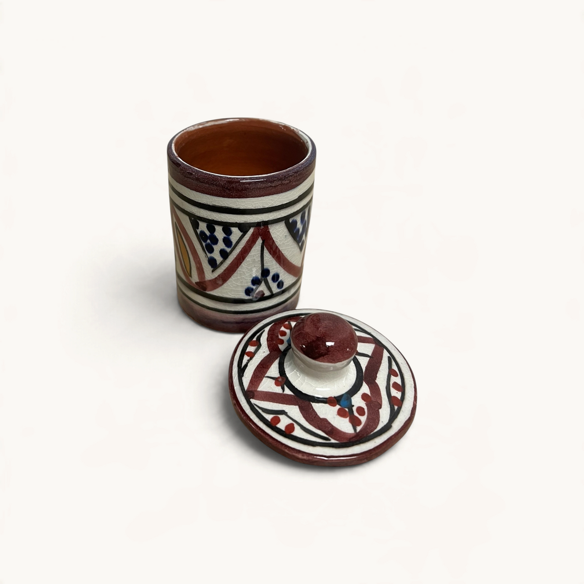 traditional-terracotta-moroccan-spice-container-white-burgundy-blue-yellow-pattern