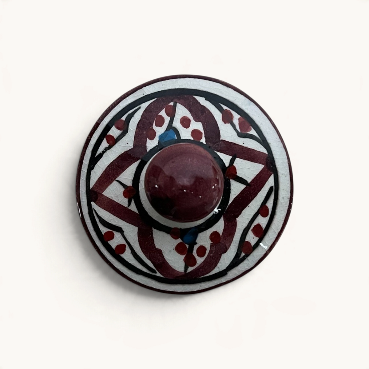 traditional-terracotta-moroccan-spice-container-white-burgundy-blue-yellow-pattern