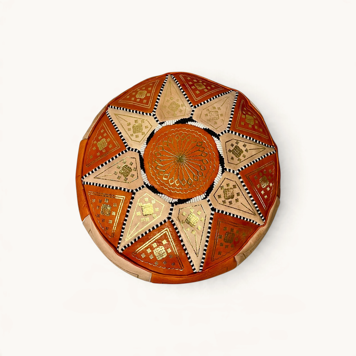 TUYYA orange and sand goat leather ottoman with hand-stitched golden medallion and floral embroidery from Fès