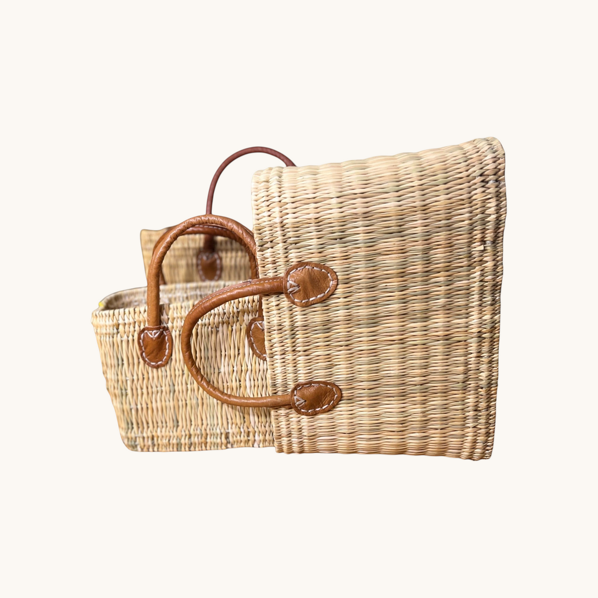 tuyya Yasmine structured Moroccan wicker picnic baskets with camel leather handles and hand-stitched rivet details