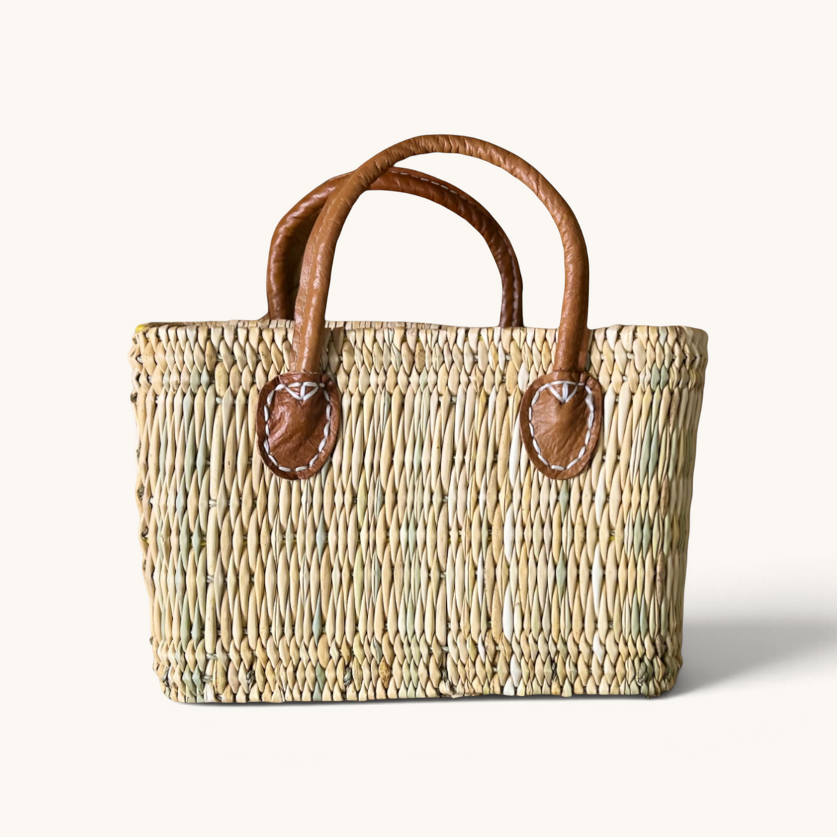 tuyya Yasmine structured Moroccan wicker basket with camel leather handles and hand-stitched rivet details